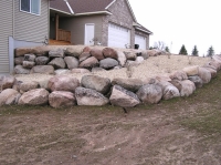 Two-tiered boulder retaining wall
