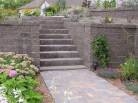 Retaining wall with staircase and walkways